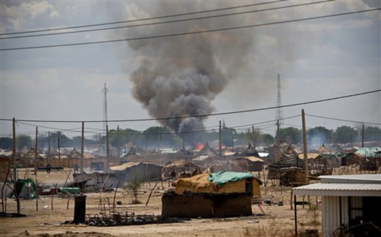 In this photo released by the United Nations Mission in Sudan (UNMIS), homes are seen burning in the town of Abyei, an area claimed by both northern and southern Sudan.